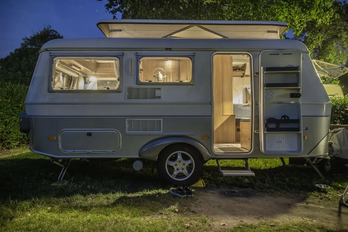 Interior of an older touring caravan being assessed for scrapping